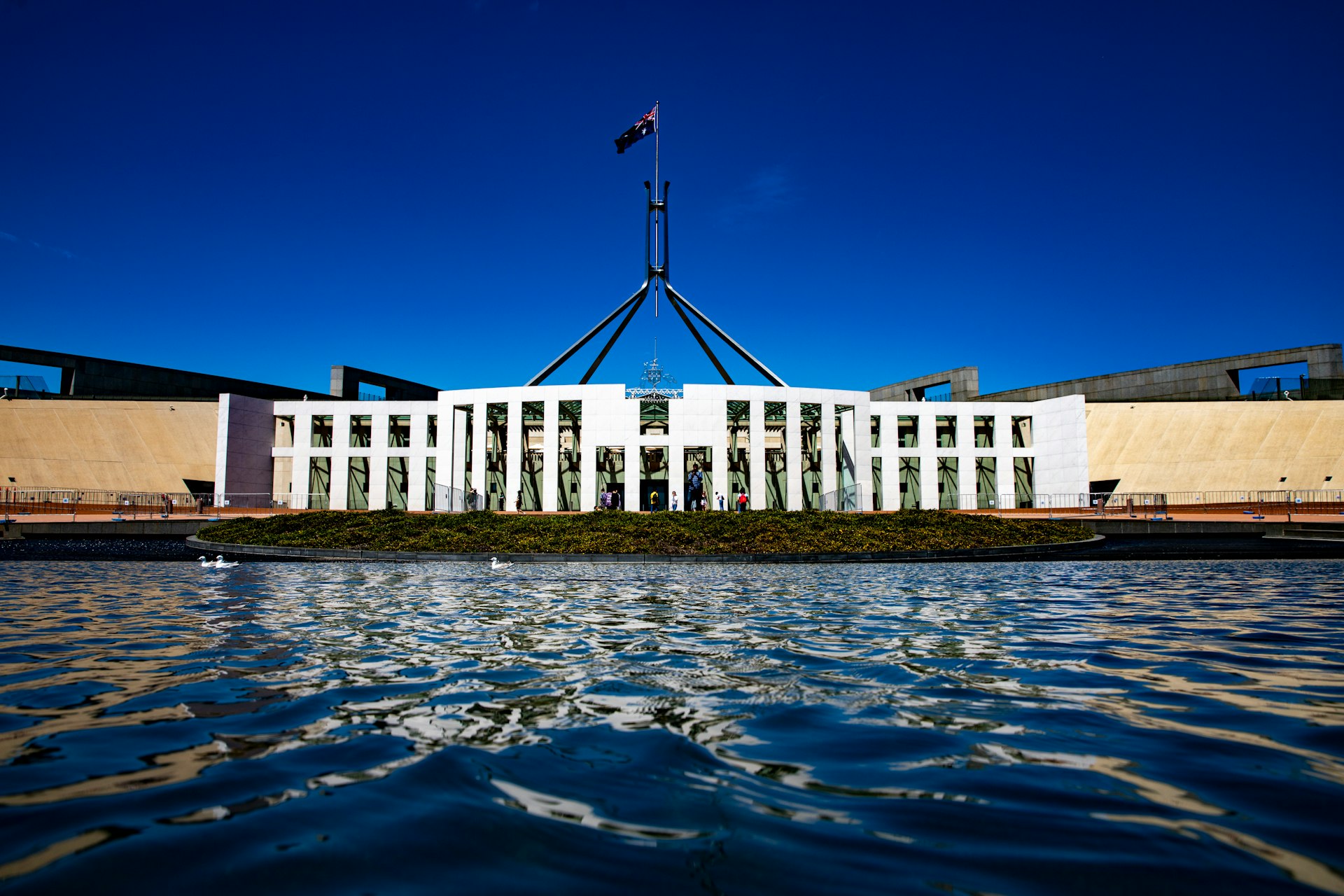 a large building with a flag on top of it